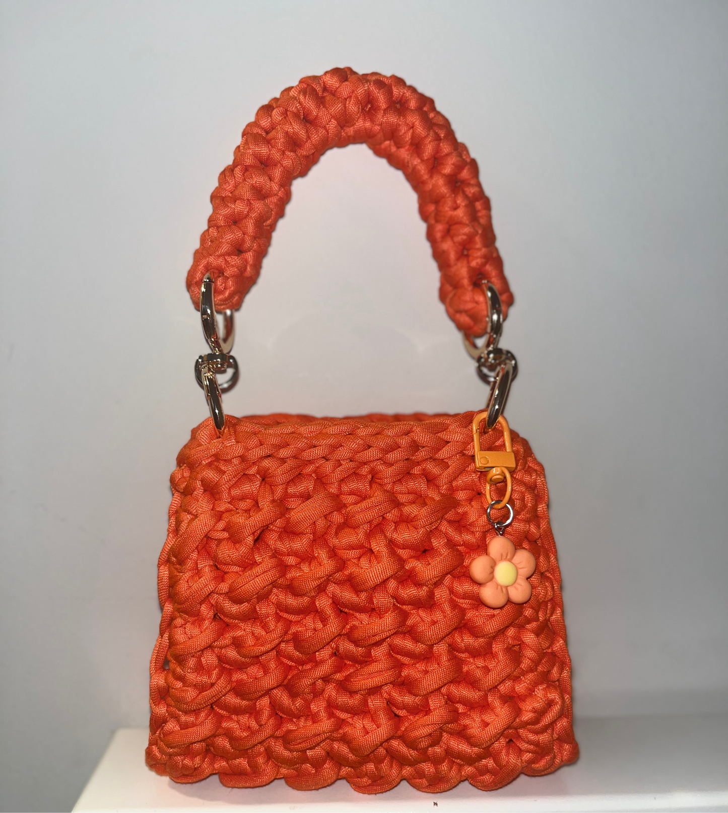 Orange colour little handbag