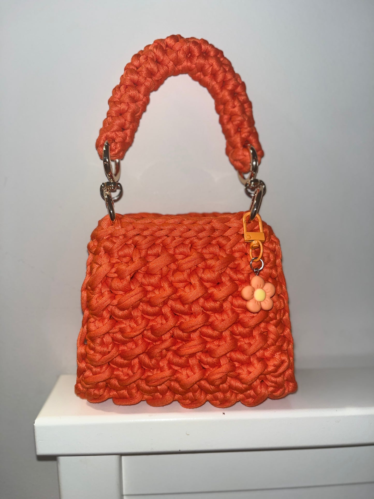 Orange colour little handbag