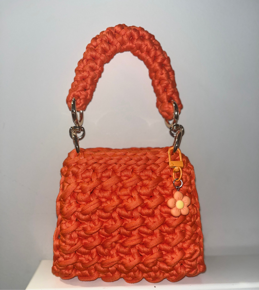 Orange colour little handbag