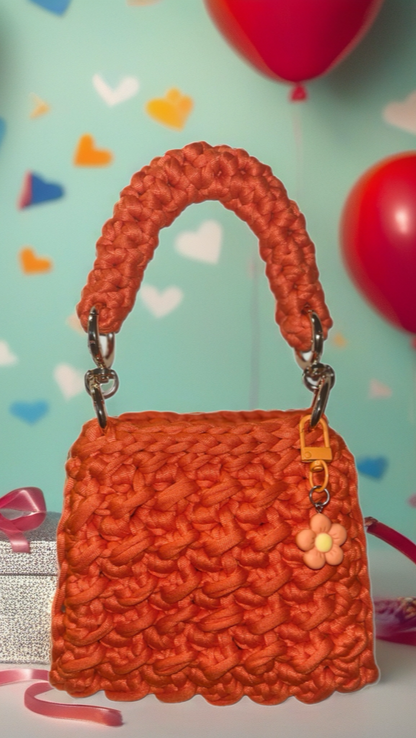 Orange colour little handbag