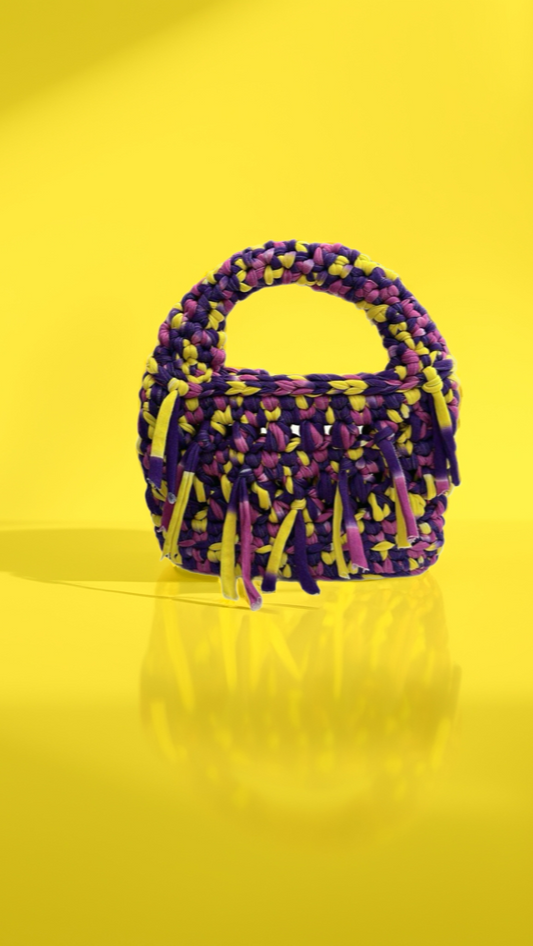 Vibrant purple-yellowish handbag for teens